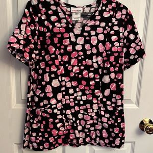 Scrubstar pretty scrubs top. Like new. Barely ever worn.
